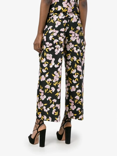 Shop Marni Floral Print Trousers In Black