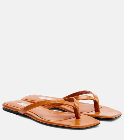 Totême Toteme Crocodile-effect Leather Flip Flops In Orange