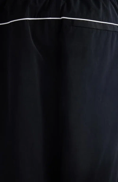 Acne Studios Color-blocked Piping Casual Pants In Black