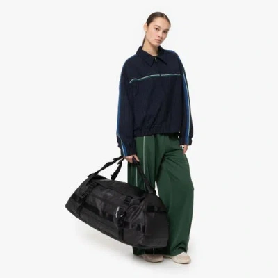 Eastpak Small Tarp Black2 Duffel Pack At Urban Outfitters