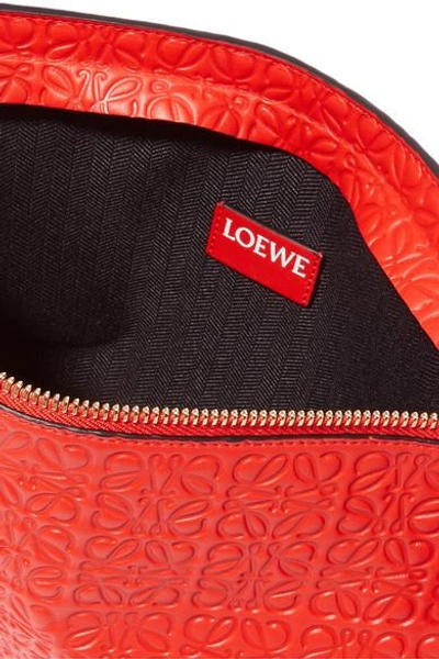 Shop Loewe T Embossed Leather Clutch