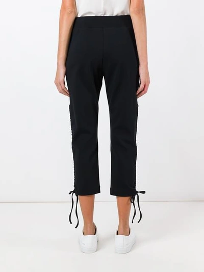 Shop Moschino Drawstring Track Pants In Black