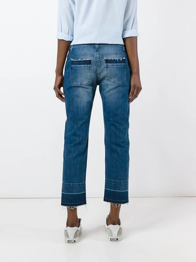 Shop Michael Michael Kors Released-hem Straight-leg Jeans In Blue