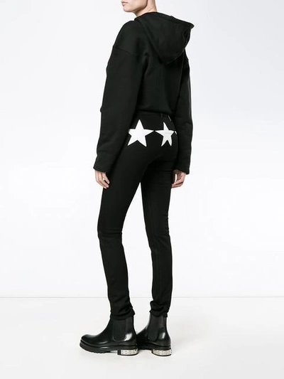 Shop Givenchy Star Motif Skinny Jeans In Black