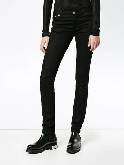 Shop Givenchy Star Motif Skinny Jeans In Black