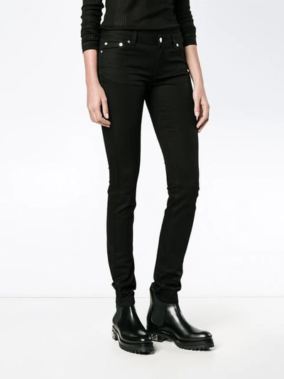 Shop Givenchy Star Motif Skinny Jeans In Black
