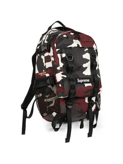 Supreme Logo-detail All-over Pattern Backpack In Red
