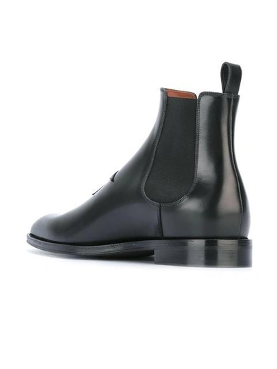 Shop Givenchy Star Patch Chelsea Boots - Black