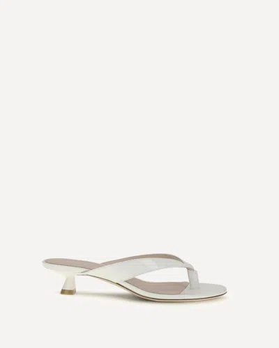 Stuart Weitzman 35mm Rio Sleek Patent Leather Thong Sandals In White