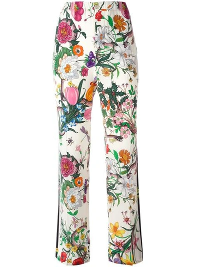 Shop Gucci Flora Snake Print Trousers In White