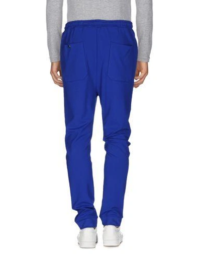 Shop Oamc Casual Pants In Bright Blue