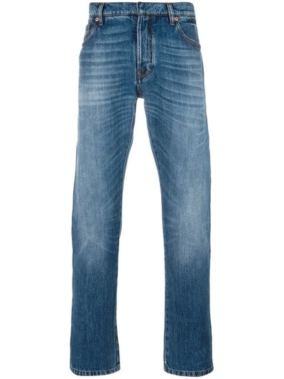 Shop Valentino Rockstud Embellished Jeans In Blue