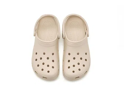 Crocs Solid Color Classic Clogs With Cut-out Details In Brown