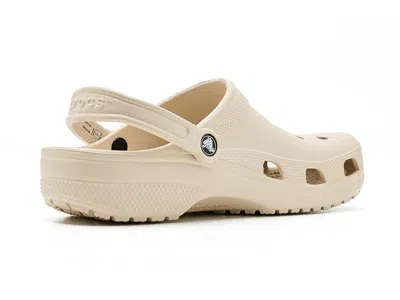 Crocs Solid Color Classic Clogs With Cut-out Details In Brown