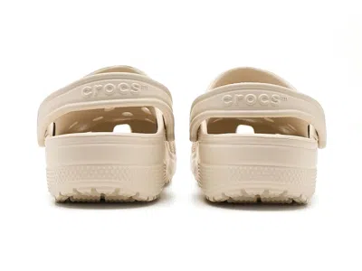 Crocs Solid Color Classic Clogs With Cut-out Details In Brown