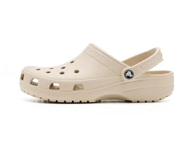 Crocs Solid Color Classic Clogs With Cut-out Details In Brown