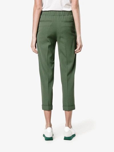 Shop Vince Tapered Trousers In Green