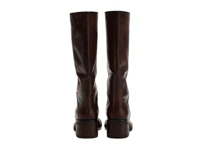 Free People Dana Distressed Pull On Boots Cognac In Multi