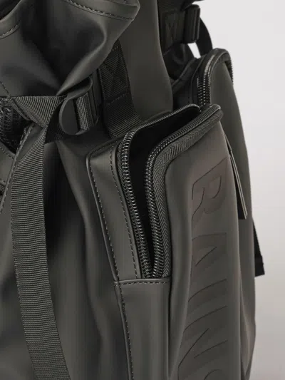 Rains Logo-print Multi-pocket Backpack In Black