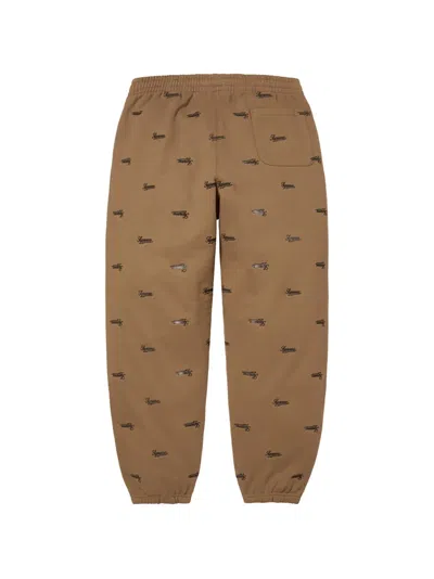 Supreme Repeat Script Track Pants In Brown
