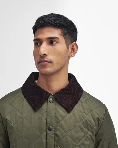 Barbour Heritage Liddesdale Green Jacket With Classic Corduroy Collar And Logo Lettering On The Front In Tec