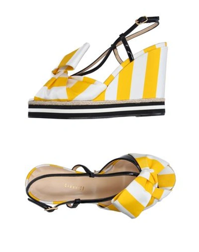 Giannico Sandals In Yellow