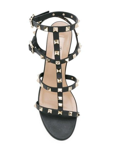 Shop Valentino Rockstud Strap Detail Sandals In Black