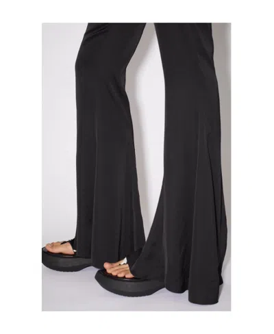 Acne Studios Flared High-waisted Trousers In Black