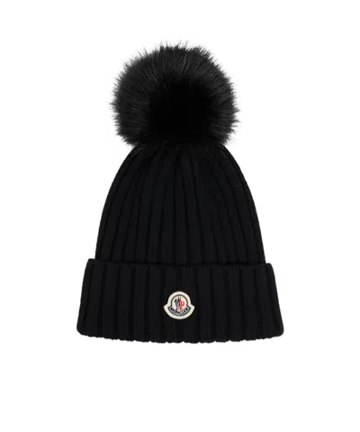 Moncler Ribbed Knit Wool Beanie With Faux Fur Pom-pom In Black