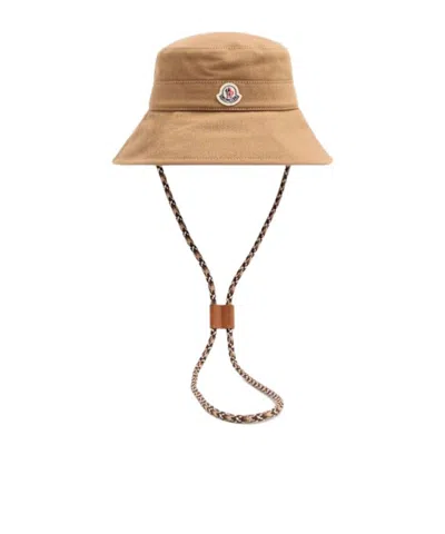 Moncler Logo Patch Drawstring Bucket Hat In Brown