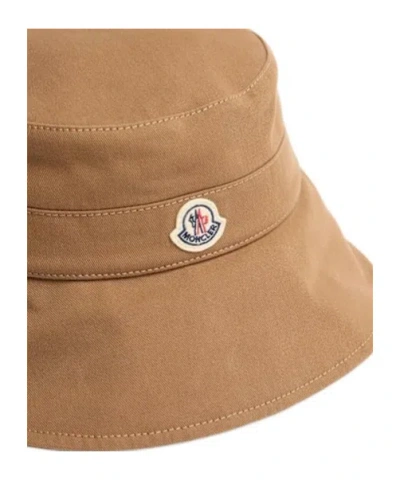 Moncler Logo Patch Drawstring Bucket Hat In Brown