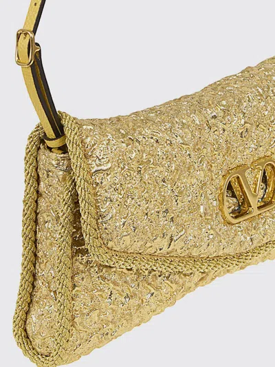 Valentino Garavani Mini Structured Handbag With Signature Detailing In Gold
