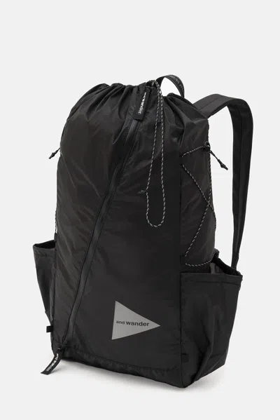 And Wander 98 Sil Daypack Backpack In Black