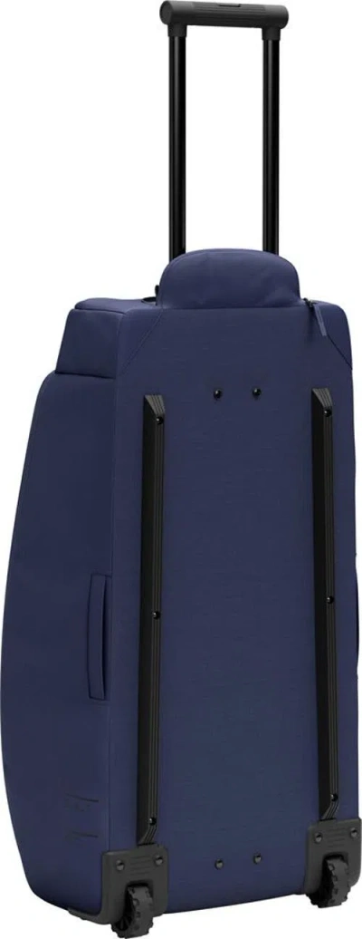 D_b_ Hugger Roller Bag Check In Blue