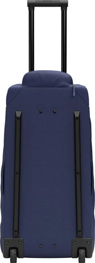 D_b_ Hugger Roller Bag Check In Blue