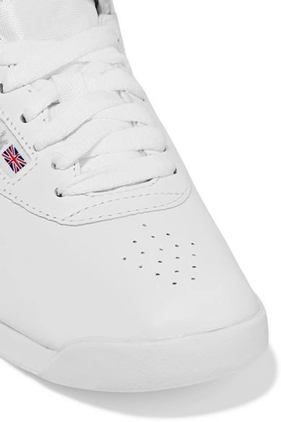 Shop Reebok Freestyle Leather High-top Sneakers