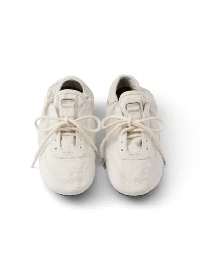 Prada Collapse Denim Sneaker In White
