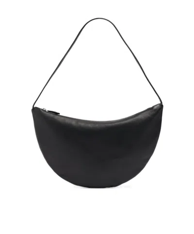 The Row Izzy Small Crescent Shoulder Bag In Leather In Black