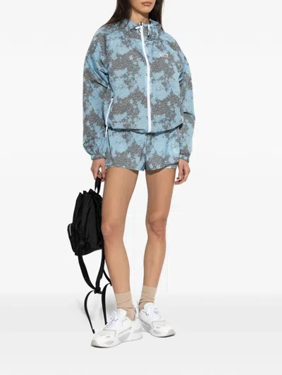 Ea7 Dynamic Athlete Patterned Hooded Jacket In Blue