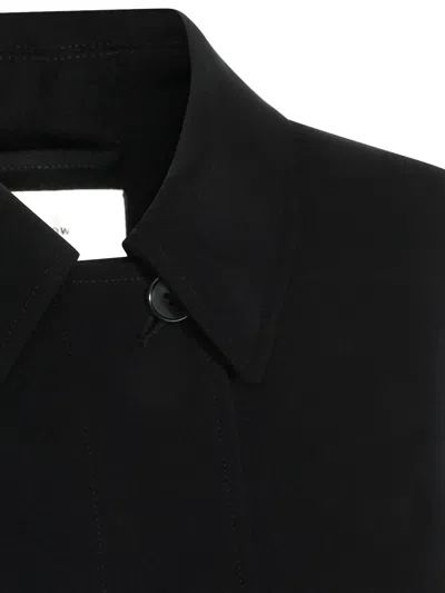 The Row Buttoned Coat In Black