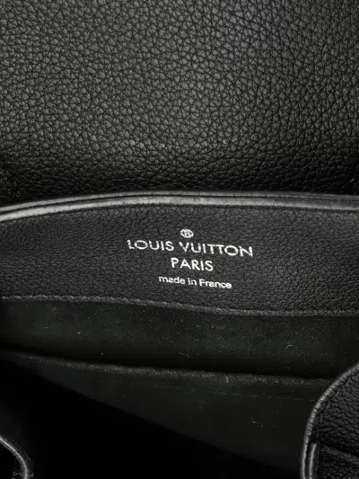 Pre-owned Louis Vuitton Lockme Leather Backpack In Black