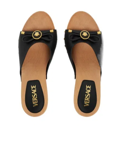Versace Opera Bow Clogs In Black
