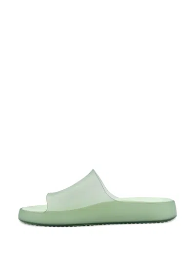 Melissa Green Slides In Green