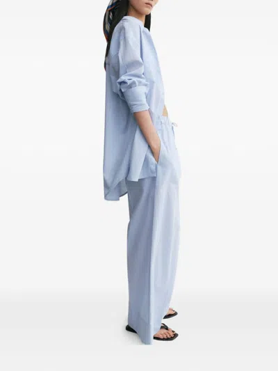 Totême Womens Sky Logo-embroidered Wide-leg Cotton And Linen Trousers In Blue