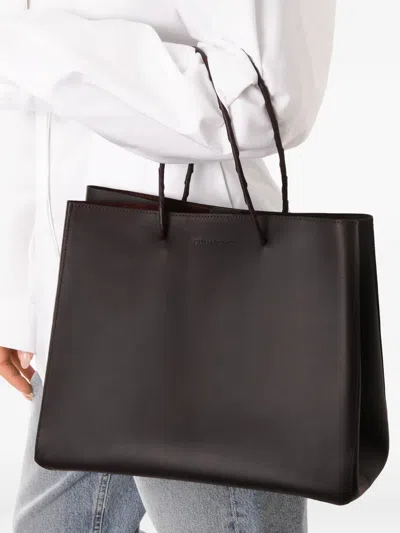 Situationist Braided-handle Tote Bag In Black