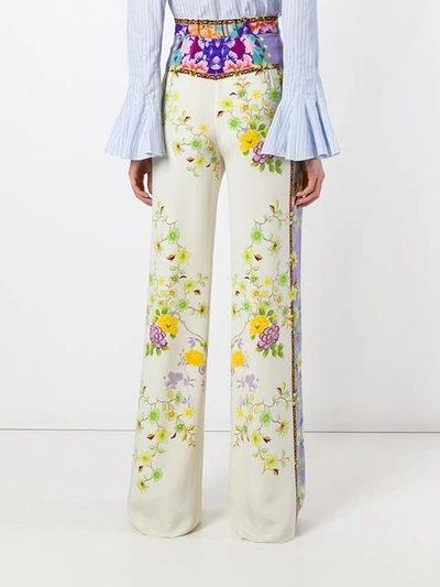 Shop Etro Floral Print Trousers