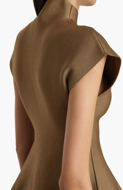 Khaite Andra Stretch-knit Turtleneck Peplum Top In Brown