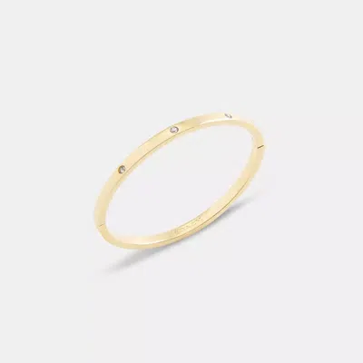 Coach Essential Hinged Bangle In Gold