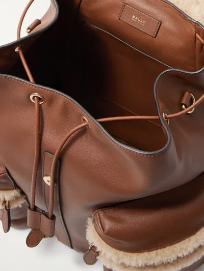 Bally Shearling-trimmed Leather Backpack In Brown