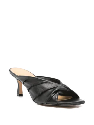 Carrano Twisted-strap Mules In Black